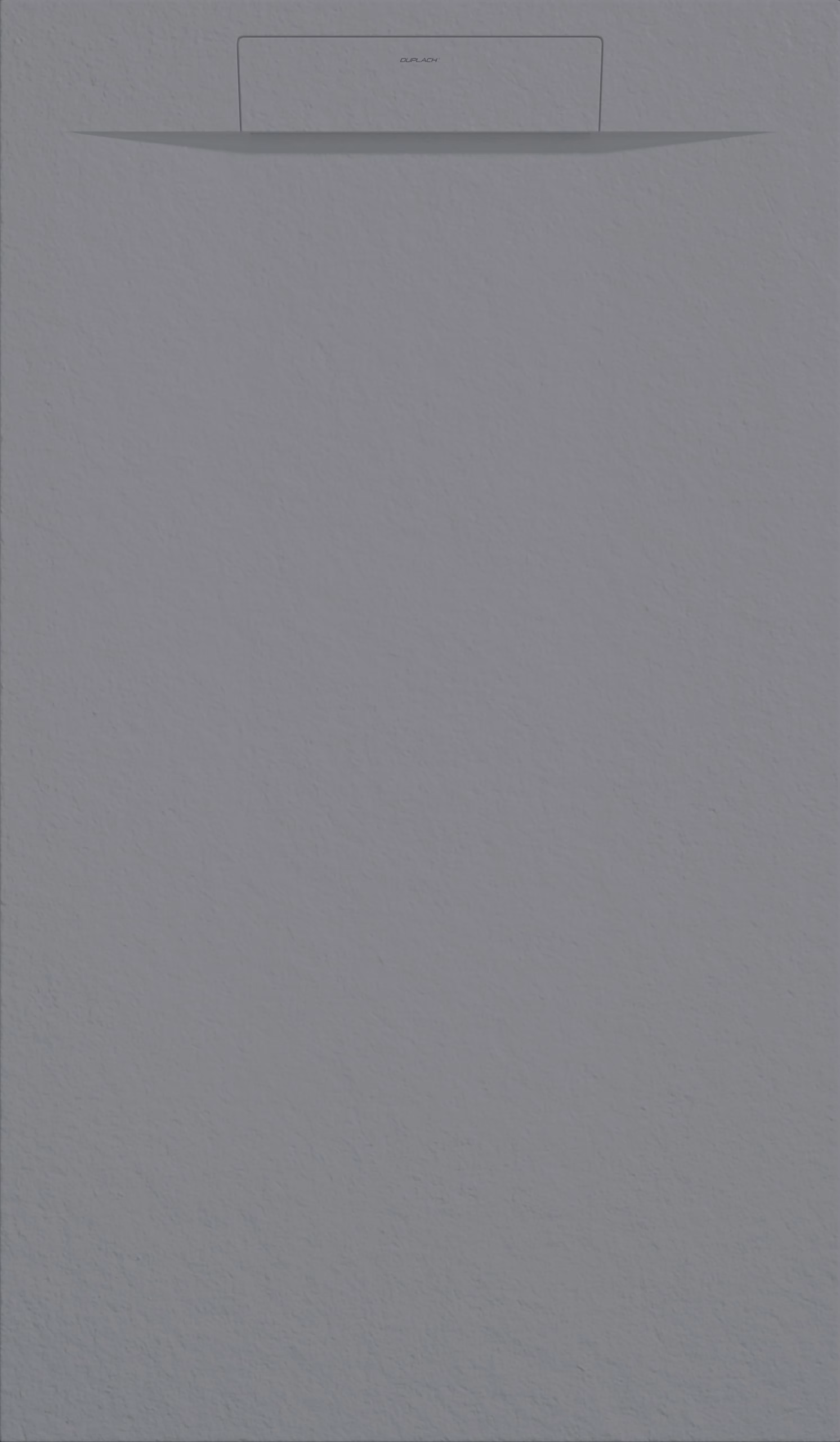 Plain gray textured wall with a small rectangular panel near the top center.